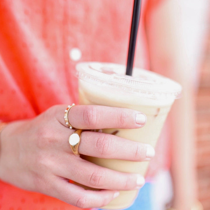  @thriftypineapple wearing Holly Pearl Ring, Claire Petite Ring, and Lex Cuff Bracelet by @brookandyork